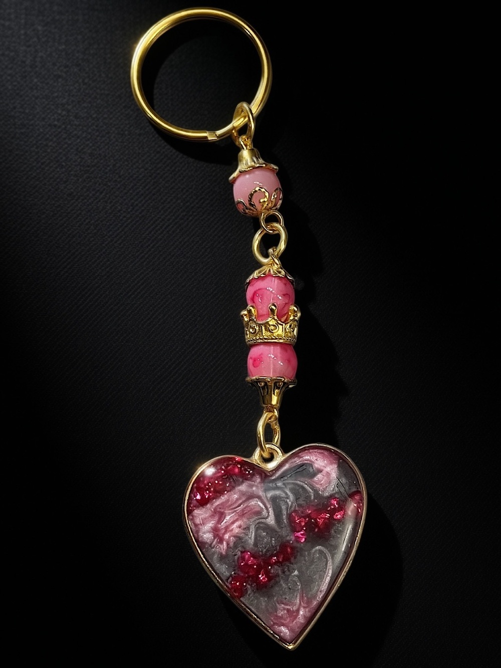 Ruby’s “Queen of Hearts Charm”
